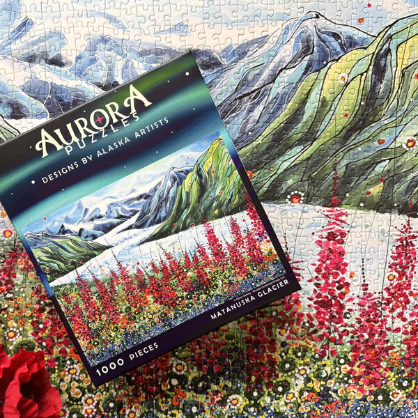 Top view of the 'Matanuska Glacier' puzzle box and completed jigsaw puzzle by Aurora Puzzles