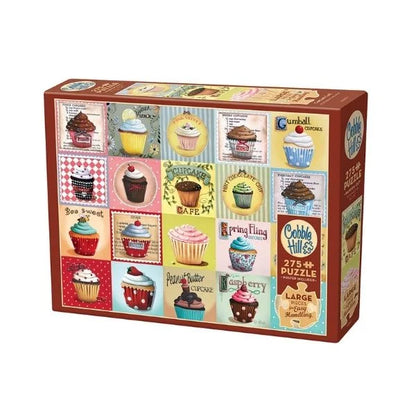 Cobble Hill puzzle box with cupcake illustrations on a white background