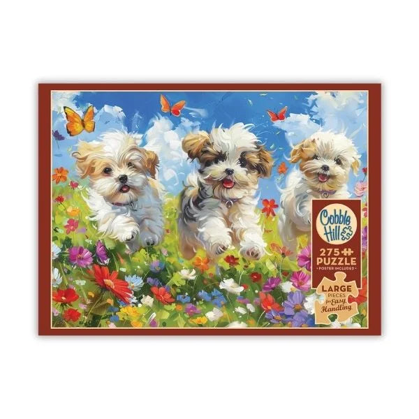 Cobble Hill puzzle box with three puppies in a field of flowers and butterflies