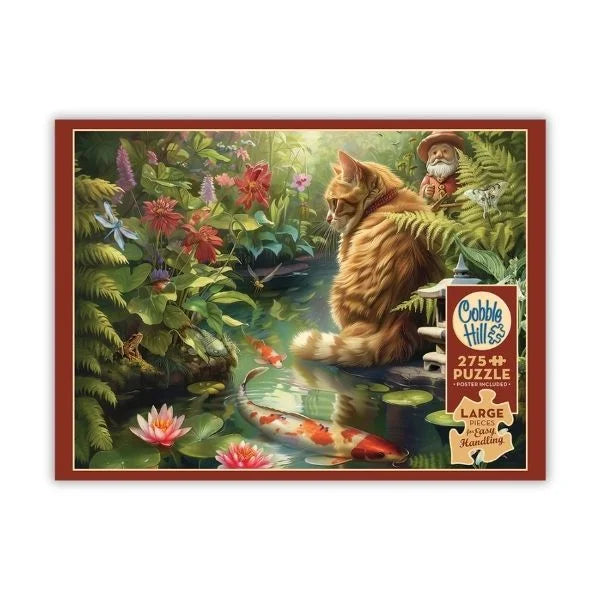 Cobble Hill puzzle box with a cat and fish scene on a white background