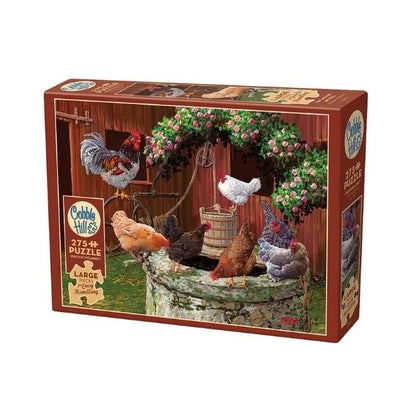 Cobble Hill puzzle box featuring chickens around a well and barn in the background