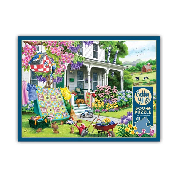 Front view of the Cobble Hill Spring Cleaning 500 Piece Jigsaw Puzzle Box