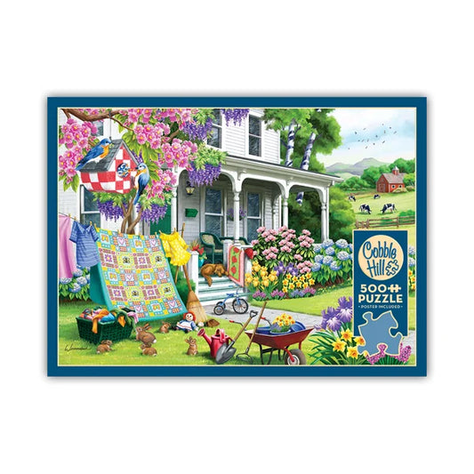 Front view of the Cobble Hill Spring Cleaning 500 Piece Jigsaw Puzzle Box