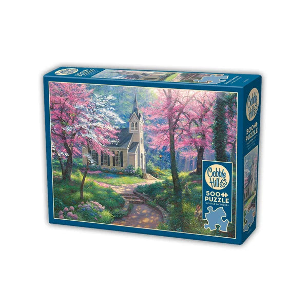 Side view of the 'Spring's Embrace' jigsaw puzzle box by Cobble Hill Puzzles